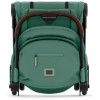Коляска Cybex Coya Rosegold Frame Aton B2 i-Size Volcano Black Leaf Green с дождевиком и бампером
